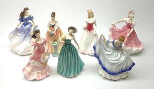 A group of seven Royal Doultan figurines, comprising of Alice HN4111, Alexandra HN3286, Olivia HN333