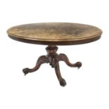 Victorian walnut loo table, highly figured oval tilt top with moulded edge, turned and gadroon carve