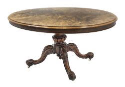 Victorian walnut loo table, highly figured oval tilt top with moulded edge, turned and gadroon carve