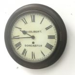 Early 20th century circular beech dial clock, the Roman dial signed 'D. Gilbert Doncaster', single t