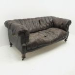 Early 20th century three seat sofa upholstered in buttoned brown leather, square tapering feet, W200