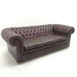 Three seat chesterfield sofa upholstered in a deep buttoned maroon leather, W205cm