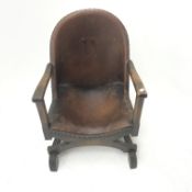 Early 20th century mahogany framed low armchair, upholstered and studded leather back and seat, W54c