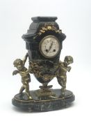 Late 20th century green marble mantel clock, urn shaped with circular Arabic dial, two gilt winged p
