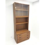 Mid century teak display cabinet on chest, two sliding glazed doors, three drawers, plinth base, W82