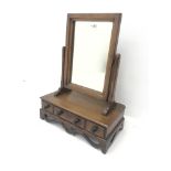 Early 20th century oak dressing table mirror, one long and two short drawers, W46cm, H62cm, D28cm, a