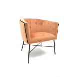 Tub shaped easy chair upholstered in bright rust velvet, metal X framed base, W68cm