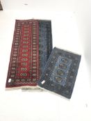 Bokhara blue ground runner, repeating border (195cm x 62cm), a matching blue ground matt and a Bokh