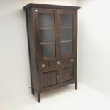 Contemporary stained hardwood glazed cabinet, two glazed doors above two drawers and two cupboards,