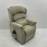 Electric reclining armchair upholstered in a neutral fabric, W75cm