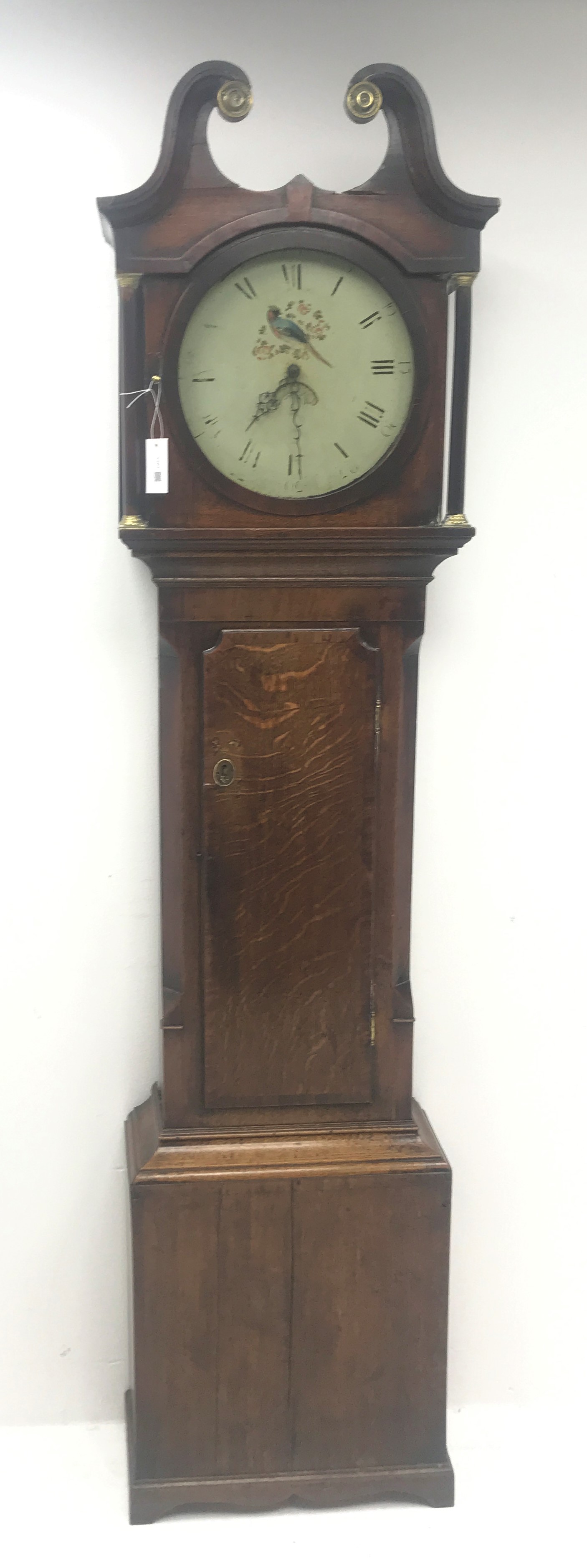 Late 18th century oak and mahogany banded longcase clock, swan neck pediment above hood with turned