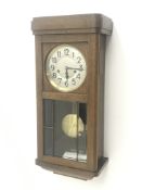 Early 20th century oak cased wall clock, circular silvered Arabic dial, enclosed by bevel glass pane