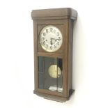 Early 20th century oak cased wall clock, circular silvered Arabic dial, enclosed by bevel glass pane
