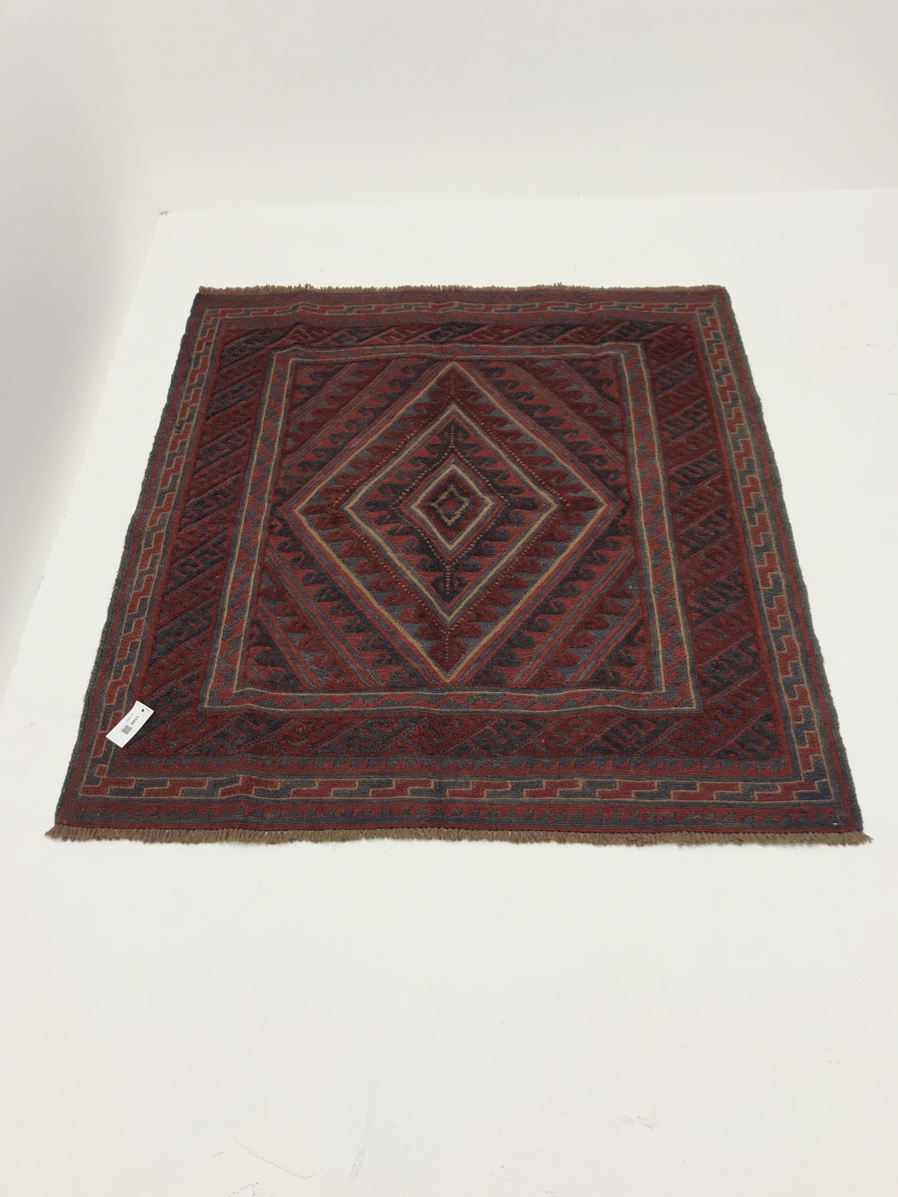 Gazak red and blue ground rug, central medallion, 120cm x 114cm