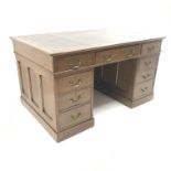 Edwardian oak twin pedestal partners desk, brown leather inset top, twelve drawers, two cupboards, p
