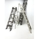 Three folding vintage wooden step ladders (L230cm max)