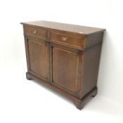 Gotts of Pickering inlaid mahogany side cabinet, two drawers above two cupboards, shaped plinth base
