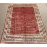 Large Persian Araak red ground rug, multiple band border, repeating boteh motifs field, 392cm x 284c