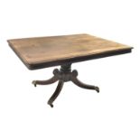 Regency mahogany breakfast table, rectangular moulded tilt top with rounded corners, turned and carv