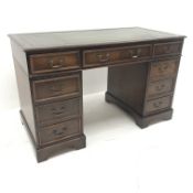 Georgian style mahogany twin pedestal desk, green leather inset top, nine drawers, shaped plinth bas