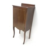 20th century inlaid mahogany music cabinet, raised back, single door, shaped supports, W48cm, H109cm