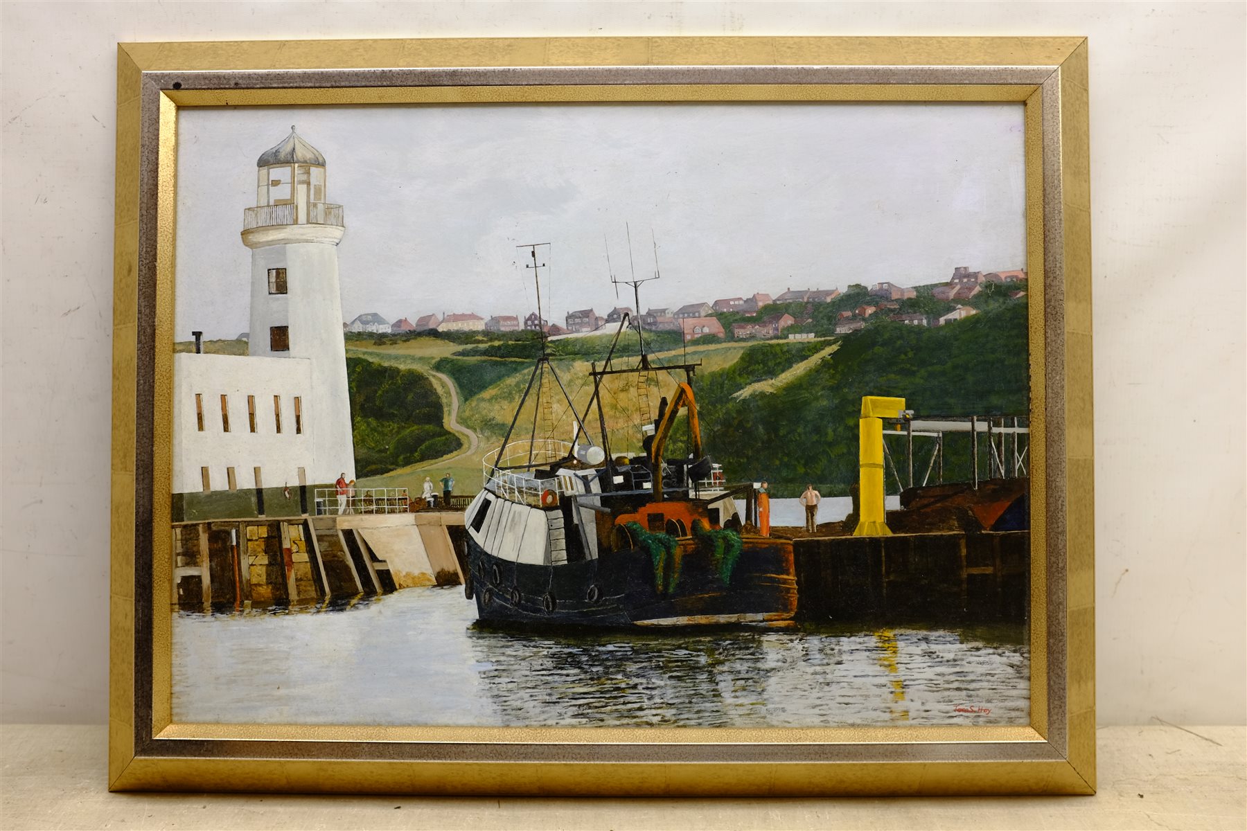 Tom S Hoy (British 20th century): Trawler Moored by Scarborough Lighthouse, acrylic on board signed - Image 2 of 2