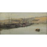 William Ayerst Ingram (British 1855-1913): Boats by the Quayside, oil on canvas signed 17cm x 34cm