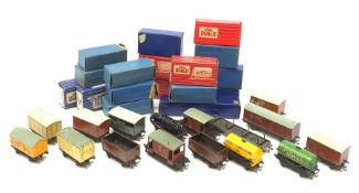 Hornby Dublo - sixteen goods wagons comprising Meat Van D1, Cattle Truck D1, Petrol Tank Wagon D1, G