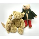 Paddington Bear soft toy, probably by Gabriel Designs with green duffle coat and Dunlop red Wellingt