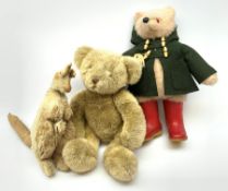 Paddington Bear soft toy, probably by Gabriel Designs with green duffle coat and Dunlop red Wellingt
