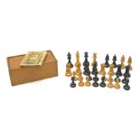 Unmarked Staunton pattern boxwood and ebonised chess set, king H8.5cm, in wooden box with sliding li