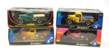 Four Solido Prestige/Custom die-cast models of Ford Pick-Up/Publicitaire trucks with various liverie