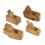A miniature boxwood smoother 3" x 1 1/4" and three other small beech planes G