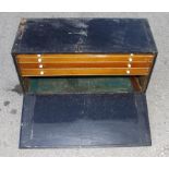 A tool box with four drawers G