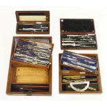 Four sets of drawing instruments in wood cases G