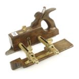 A MATHIESON No 10 bridle plough with hollow brass stems,