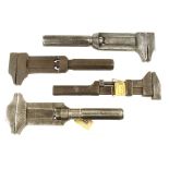 Four large adjustable wrenches with octagonal handles by WILLIAM REID,