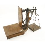 An unusual 18/19c set of wooden scales 28" x 11" x 19"h.