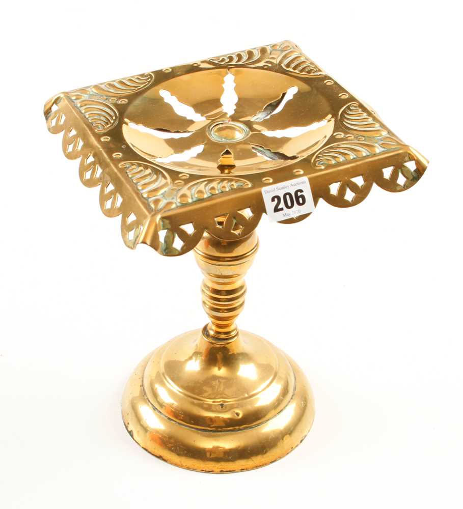 A brass kettle or pot stand with punched decoration 10" high