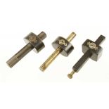 Three ebony and brass mortice gauges G+