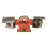 A reverse running bench grinder by CREUSEN ideal for turning tools and chisel sharpening 240v Pat