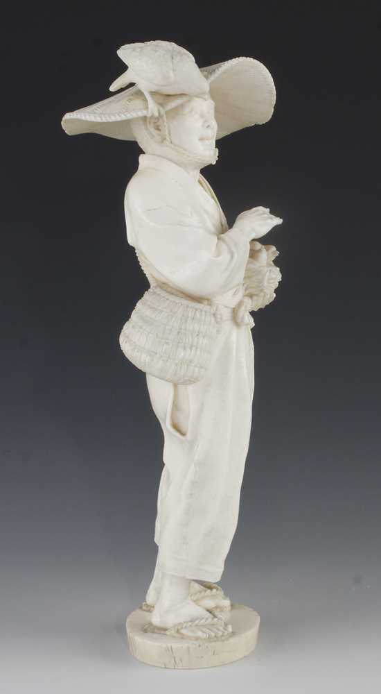 A 10" ivory okimono of a man carrying a nest with two fledglings and the concerned mother bird on - Image 4 of 5