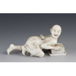 An ivory okimono of a rat catcher signed HIRONARI 4" x 2"