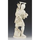 A 14" ivory okimono of a man collecting corn and sunflowers weighing 2.8Kg AF