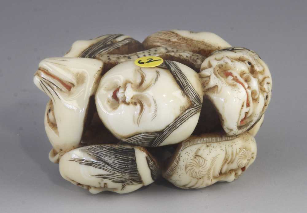 An ivory netsuke of 9 Noh masks - Image 2 of 5