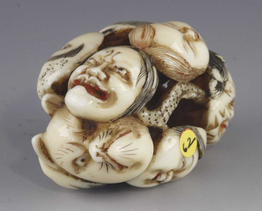 An ivory netsuke of 9 Noh masks - Image 5 of 5