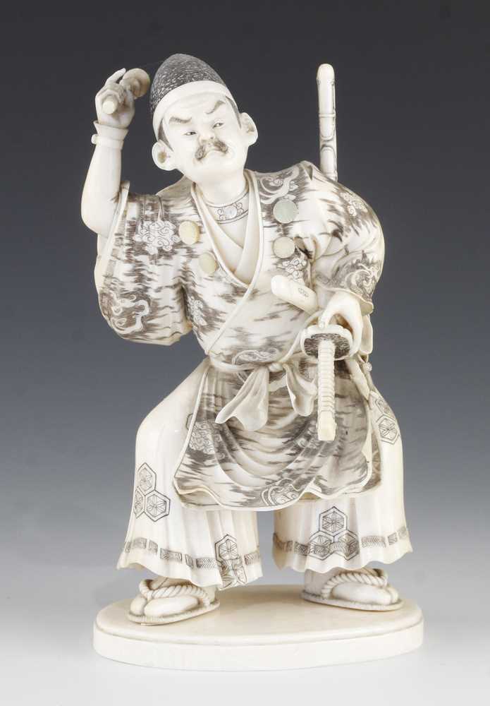 A fine 5 1/2" ivory okimono of a Samurai