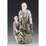 A very fine quality 7" ivory okimono of a fisherman and his son with cormorant and their catch