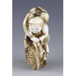 An ivory netsuke of Daikoku.