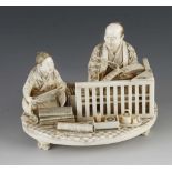 A fine ivory okimono of a draper taking notes as his apprentice measures the cloth 5" x 4"